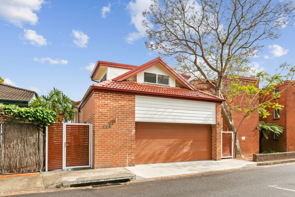 Sydney first-floor addition showing modern two-storey home with new upper level
