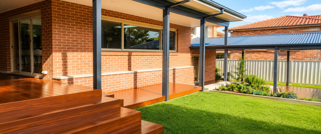 Sydney home extension with covered outdoor entertaining area and timber decking built by Elite Additions